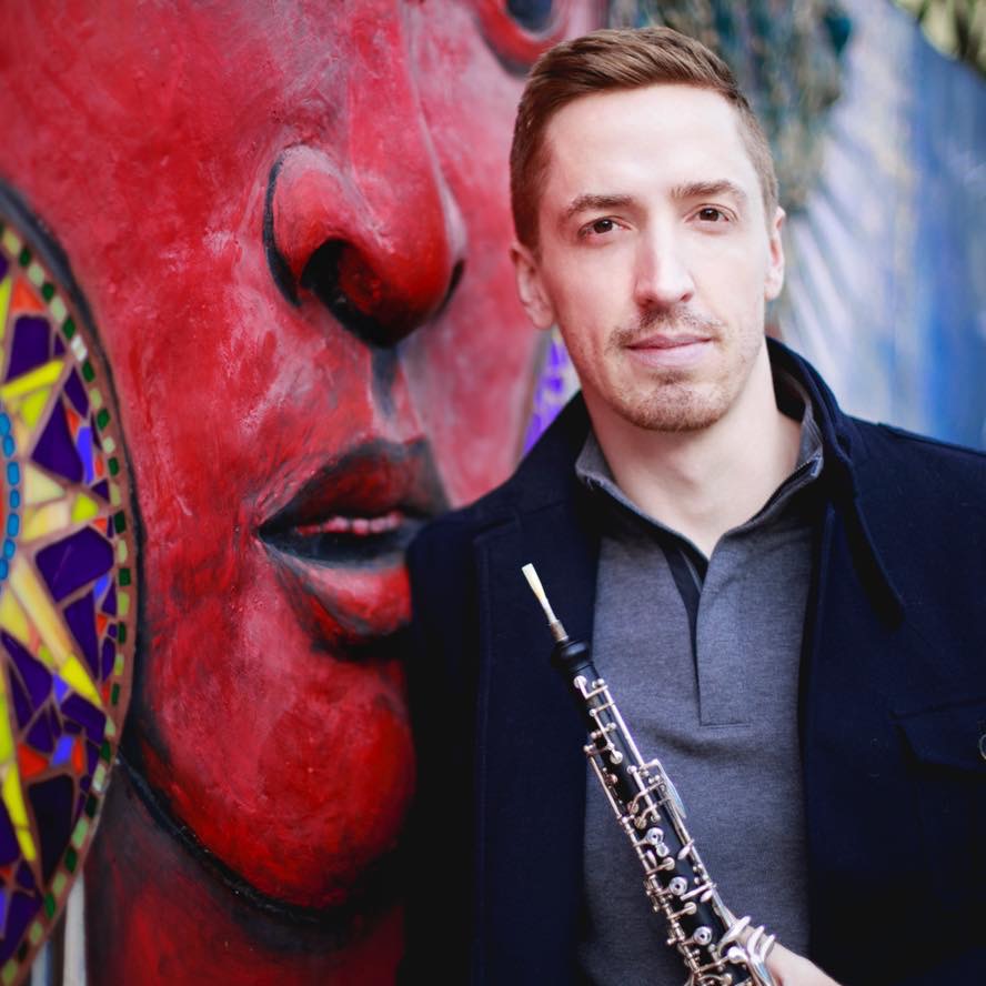 James Button holding an oboe